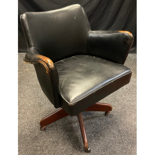 103 - A mid 20th century Hillcrest leather revolving office chair, deep black/brown weathered upholstery, ... 