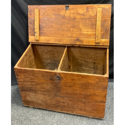 104 - A pine blanket box/storage chest, with sloping hinged lid, two section interior, 72.5cm high, 100cm ... 