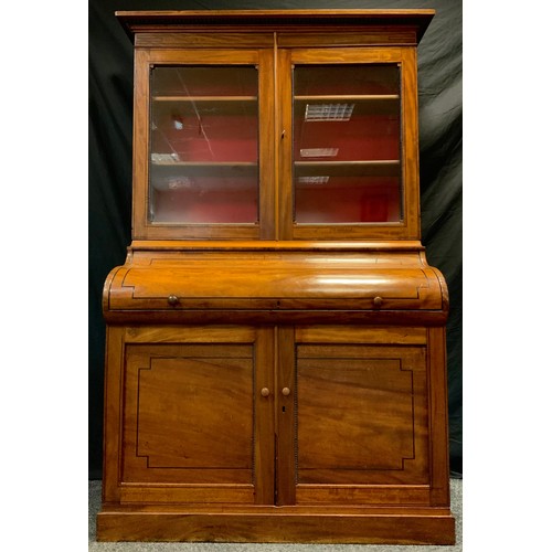 123 - A Victorian mahogany Secretaire cylinder-top bookcase, out-swept cornice, pair of glazed doors enclo... 