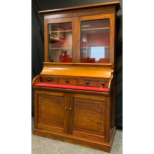 123 - A Victorian mahogany Secretaire cylinder-top bookcase, out-swept cornice, pair of glazed doors enclo... 