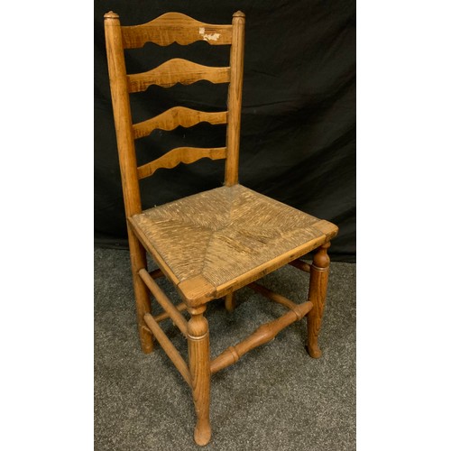 126 - A 19th century lyre back corner chair, rush seat, turned legs & stretchers, 62cm high, 58cm wide, 59... 