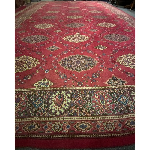 281 - A large Persian style Dursax woollen carpet, by Hugh Mackay & Co, Durham Carpets, the field with twe... 