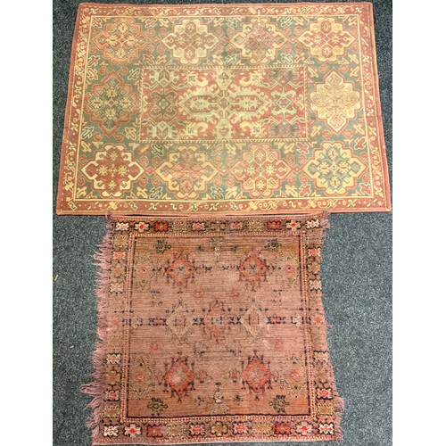 306 - An Aubusson type woollen rug, geometric medallions in tones of burnt orange, green and cream, approx... 