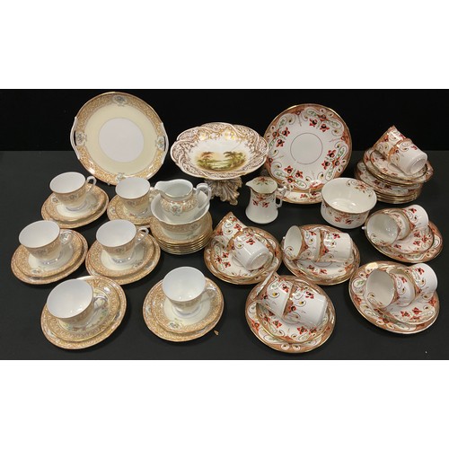 197 - A Noritake floral tea set, for six;  another Edwardian Staffordshire tea set, for twelve