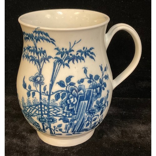 55 - A large Worcester Plantation pattern bell shaped mug, printed in cobalt blue, 15cm high, c.1770