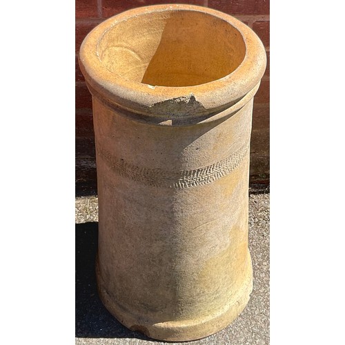 930 - A terracotta chimney pot; another smaller (2)