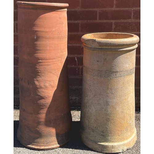 930 - A terracotta chimney pot; another smaller (2)