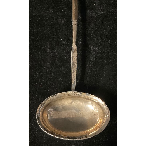 252 - A Georgian silver toddy ladle, inscribed SWA, balleen handle, 39cm long