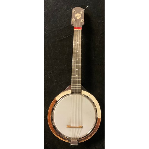 964 - Musical Instruments - an early 20th century Keech banjolele, cased