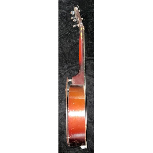 964 - Musical Instruments - an early 20th century Keech banjolele, cased