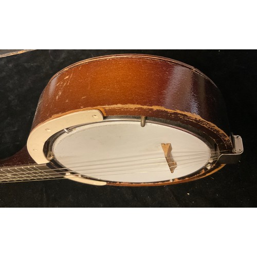 964 - Musical Instruments - an early 20th century Keech banjolele, cased