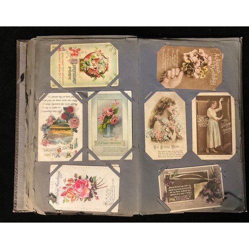 1026 - An Edwardian postcard album, containing early 20th century and later postcards, including topographi... 