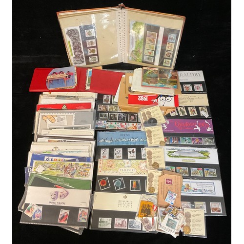 1031 - Stamps - QEII modern material p/packs and year packs plus loose in an album, f/v approx. £80+