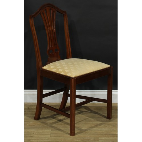 3 - A set of fourteen Hepplewhite design dining chairs, comprising twelve side chairs and a pair of carv... 