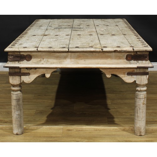 8 - An Indian acacia or mango takhat dining table, possibly Rajasthan, 77.5cm high, 195cm long, 124cm wi... 