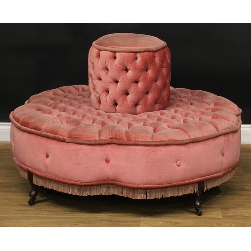 19 - A Victorian style conversation seat, stuffed-over deep-button upholstery, cabriole legs, casters, 80... 