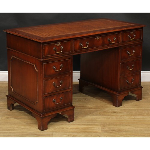 101 - A George III style mahogany twin pedestal desk, 76cm high, 122cm wide, 61cm deep