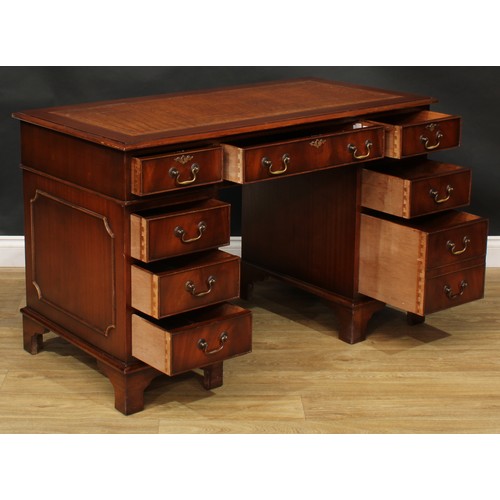 101 - A George III style mahogany twin pedestal desk, 76cm high, 122cm wide, 61cm deep