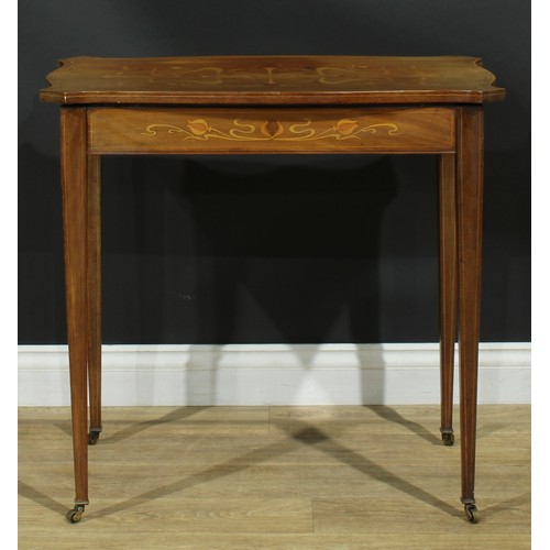 103 - An Art Nouveau mahogany and marquetry centre table, canted serpentine top inlaid with stylised flowe... 