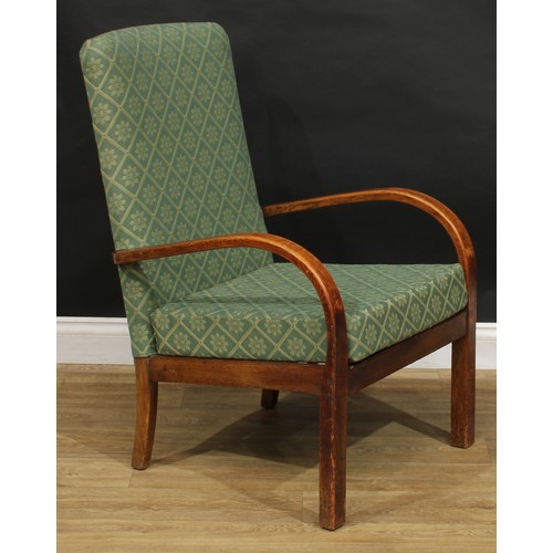 109 - A late Art Deco period oak open armchair, by Parker Knoll, 322638, 92cm high, 60.5cm wide, the seat ... 