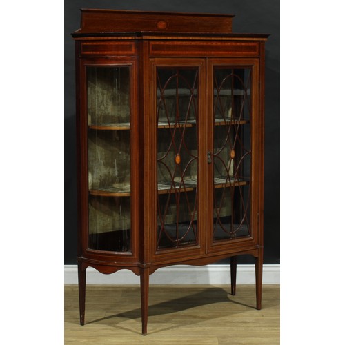 116 - An Edwardian mahogany display cabinet, half-gallery centred by an oval batwing patera, above a satin... 