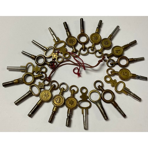 1135 - A collection of twenty pocket watch keys