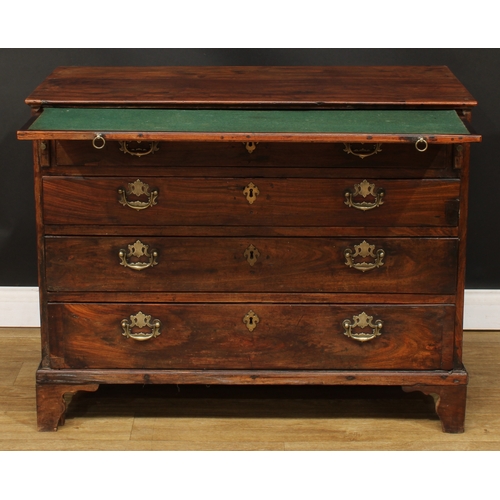 201 - A George III bachelor’s chest, rectangular top above a slide and four long graduated drawers, skirte... 