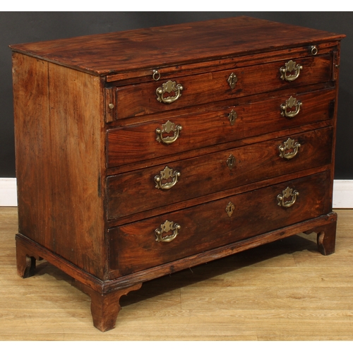 201 - A George III bachelor’s chest, rectangular top above a slide and four long graduated drawers, skirte... 