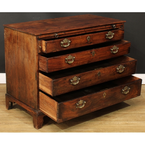 201 - A George III bachelor’s chest, rectangular top above a slide and four long graduated drawers, skirte... 