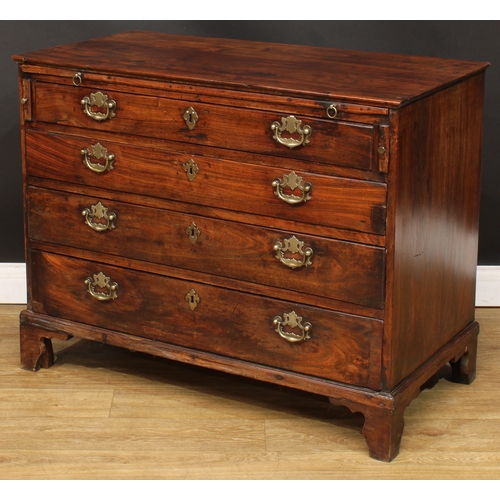 201 - A George III bachelor’s chest, rectangular top above a slide and four long graduated drawers, skirte... 