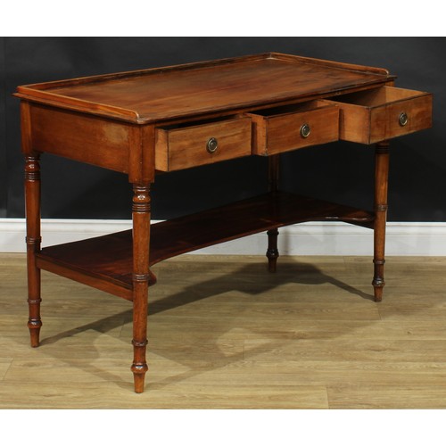 204 - A 19th century mahogany side table, rectangular top with shallow three-quarter gallery above three f... 