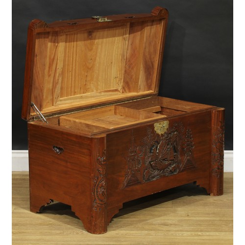 209 - A South-East Asian camphor blanket chest, hinged top carved and applied with a sailing junk and encl... 