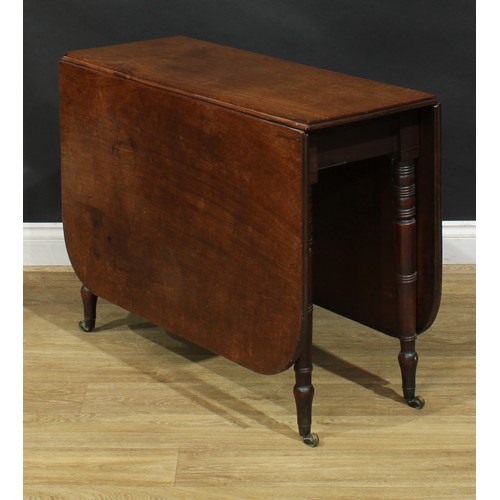 211 - A Regency mahogany gateleg table, rounded rectangular top with channelled edge and fall leaves, ring... 