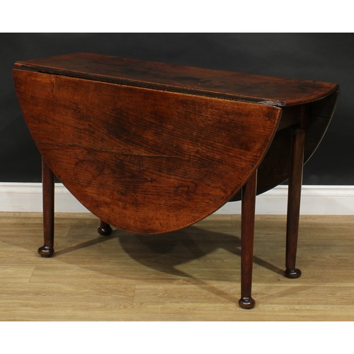 216 - A George II and later oak gateleg table, oval top with fall leaves, one a later replacement, straigh... 