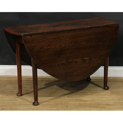 216 - A George II and later oak gateleg table, oval top with fall leaves, one a later replacement, straigh... 