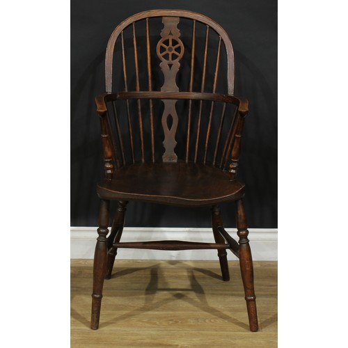 219 - A harlequin set of twelve wheelback Windsor dining chairs, comprising six side chairs and six carver... 