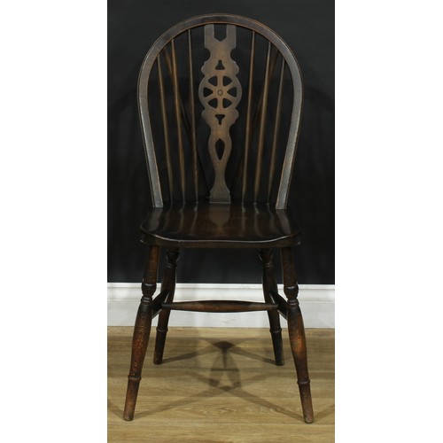 219 - A harlequin set of twelve wheelback Windsor dining chairs, comprising six side chairs and six carver... 