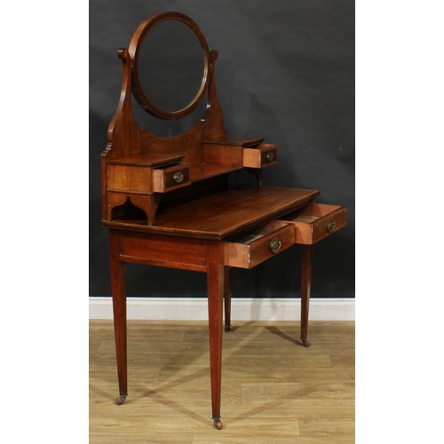 303 - A Sheraton Revival satinwood crossbanded mahogany dressing table, 158cm high, 106.5cm wide, 51cm dee... 