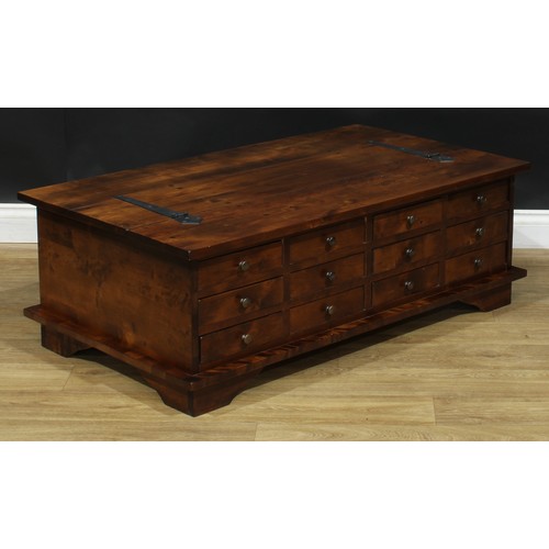 304 - A Laura Ashley birch and birch veneer Garrat coffee table, of twelve drawers, hinged cover, 40.5cm h... 