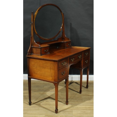 305 - An early 20th century George III Revival dressing table, the superstructure with a bevelled oval mir... 