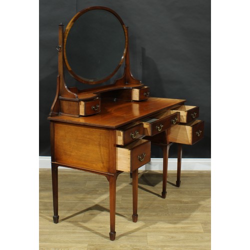 305 - An early 20th century George III Revival dressing table, the superstructure with a bevelled oval mir... 