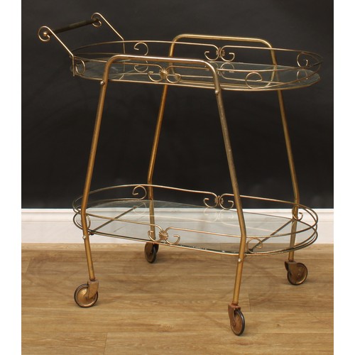 408 - A retro mid 20th century brass and glass two-tier serving trolley, 83.5cm high, 82cm long, 46.5cm wi... 