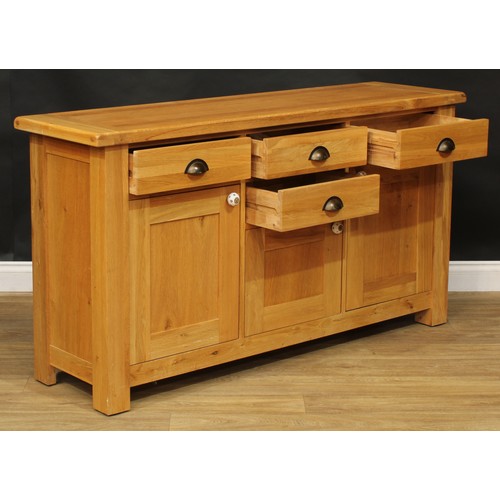 413 - A contemporary oak sideboard, 84cm high, 157cm wide, 45cm deep