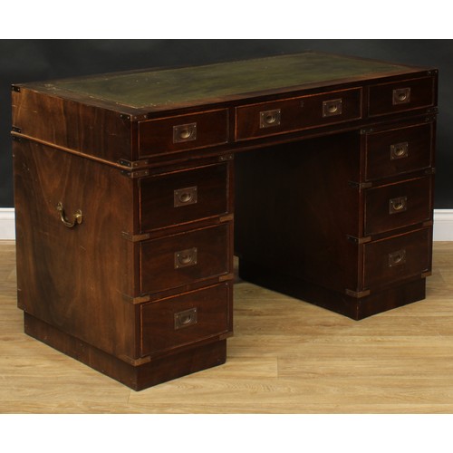 419 - A contemporary campaign inspired twin pedestal desk, 76.5cm high, 119.5cm wide, 60cm deep