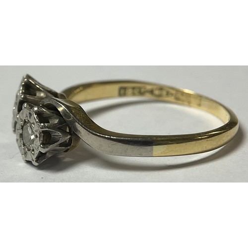 1187 - An 18ct gold and platinum two stone diamond crossover ring