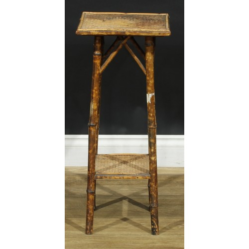 802 - An Aesthetic Movement bamboo occasional table; a set of folding display shelves (2)