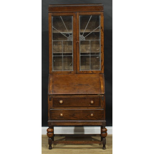 812 - An Art Deco oak bureau bookcase, 195cm high, 82cm wide, 42cm deep, c.1935