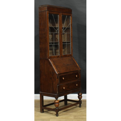 812 - An Art Deco oak bureau bookcase, 195cm high, 82cm wide, 42cm deep, c.1935