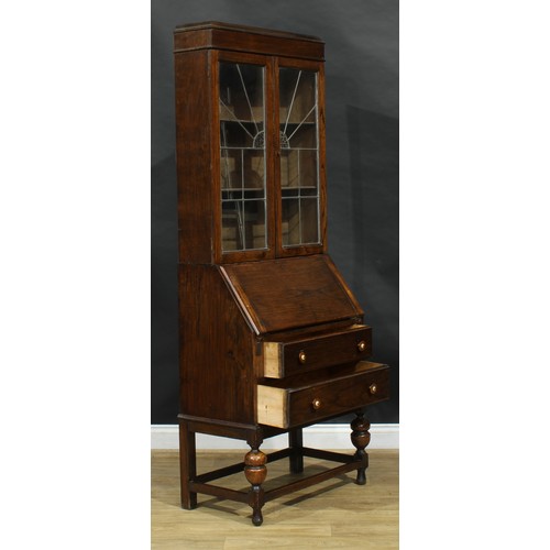 812 - An Art Deco oak bureau bookcase, 195cm high, 82cm wide, 42cm deep, c.1935