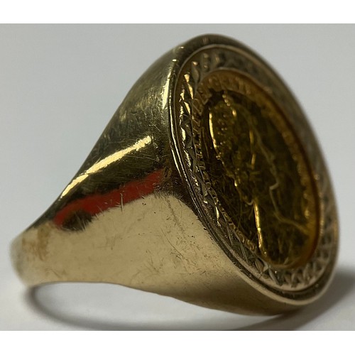 1205 - An Elizabeth II gold half sovereign, 1982, mounted in 9ct gold as a signet ring, size S, 9.5g